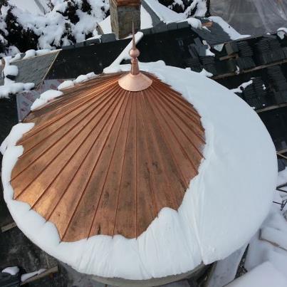 copper turret with snow