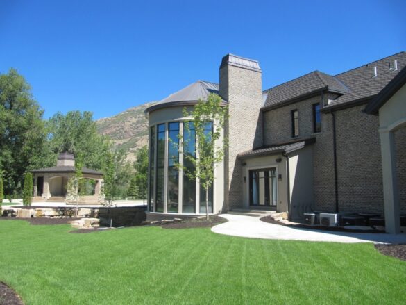 Front yard looking at home with Standing Seam roofing