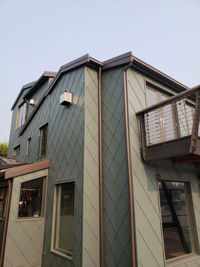 home with green chromium oxide cladding