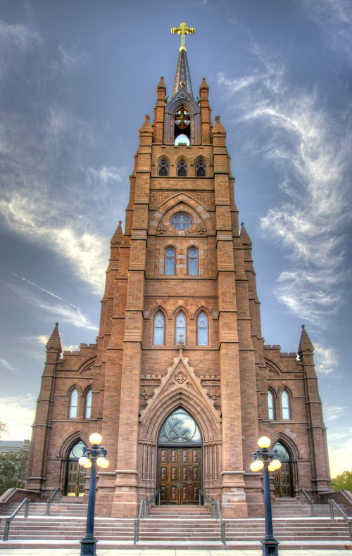 Cathedral with a copper steeple restored by Spengler Industries