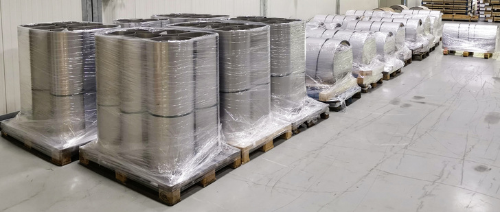 Stainless Steel coils packed up in a warehouse ready to ship
