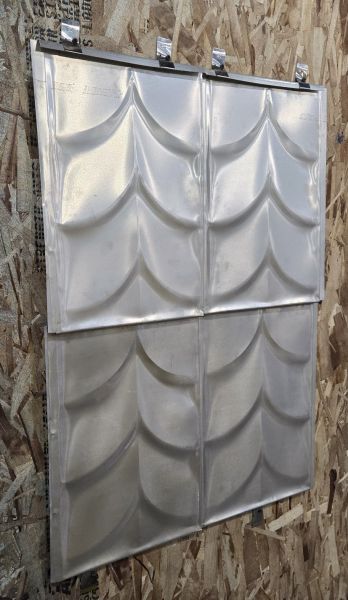 Pressed metal shingles for historic roof restoration by Spengler Industries