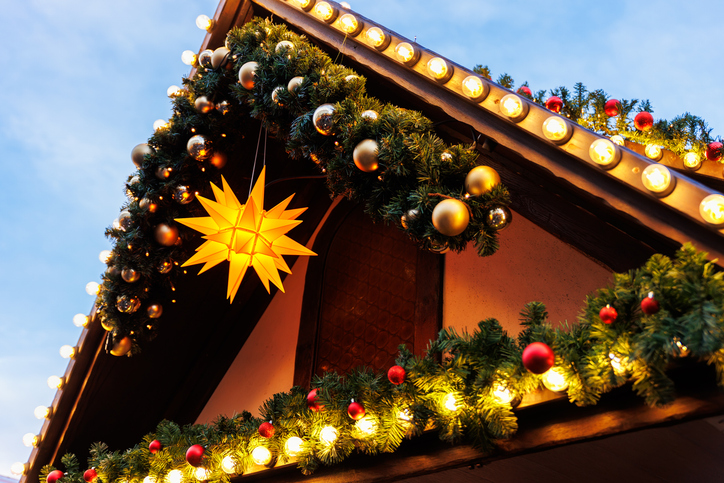 Traditionally decorated German roof featuring intricate craftsmanship, and festive holiday decorations