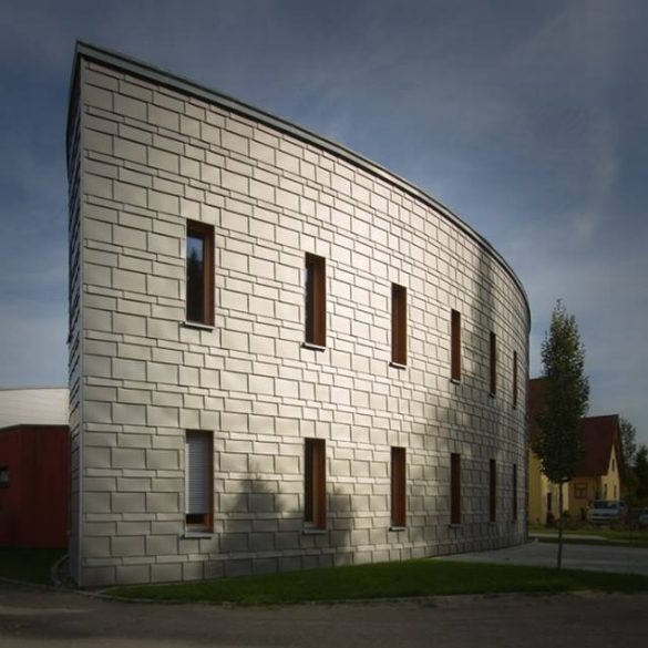 Beautiful metal wall cladding on radius wall